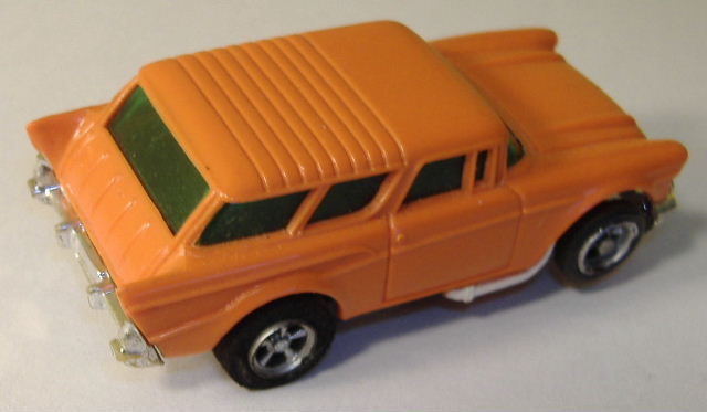 3957 Chevy Nomad medium orange white pipes Very good condition overall with