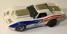 AFX slot car A/P Corvette in white with red, blue, and silver stripe