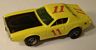 AFX Dodge Charger stocker in yellow with red #11